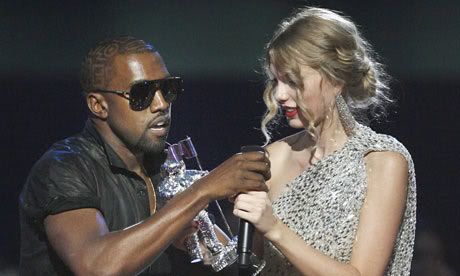 Kanye-West-grabs-the-mic--001.jpg